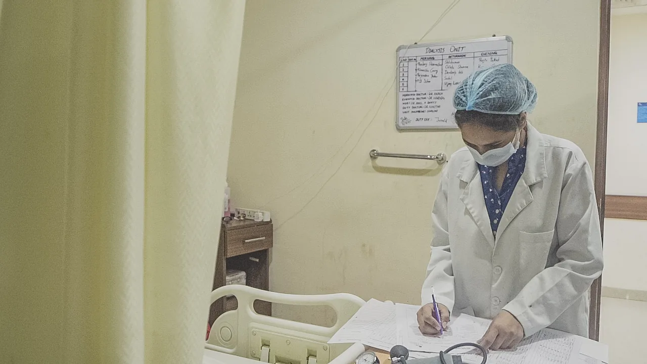Doctor charting at Renacare dialysis unit